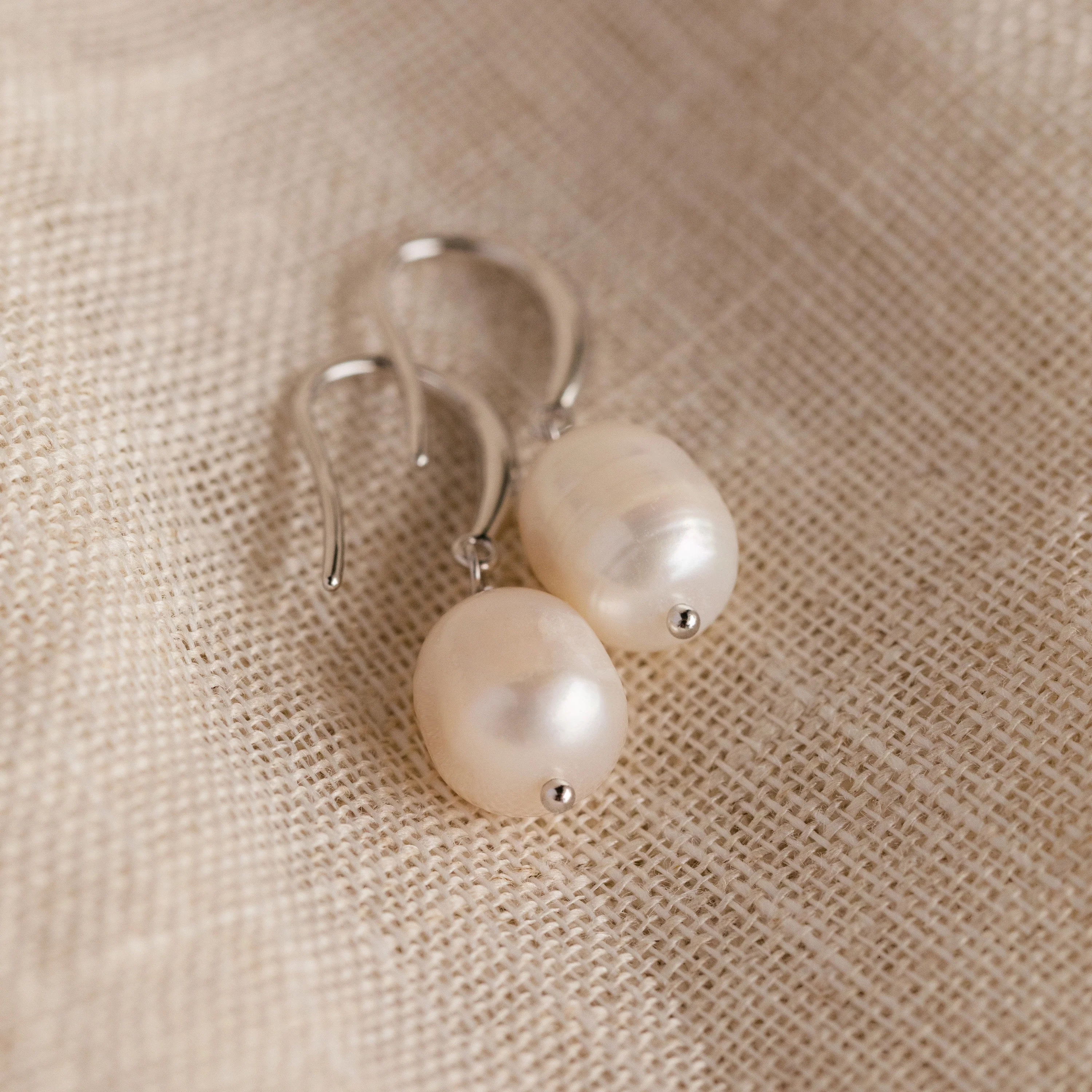 Dangling Pearl Drop Earrings in Silver