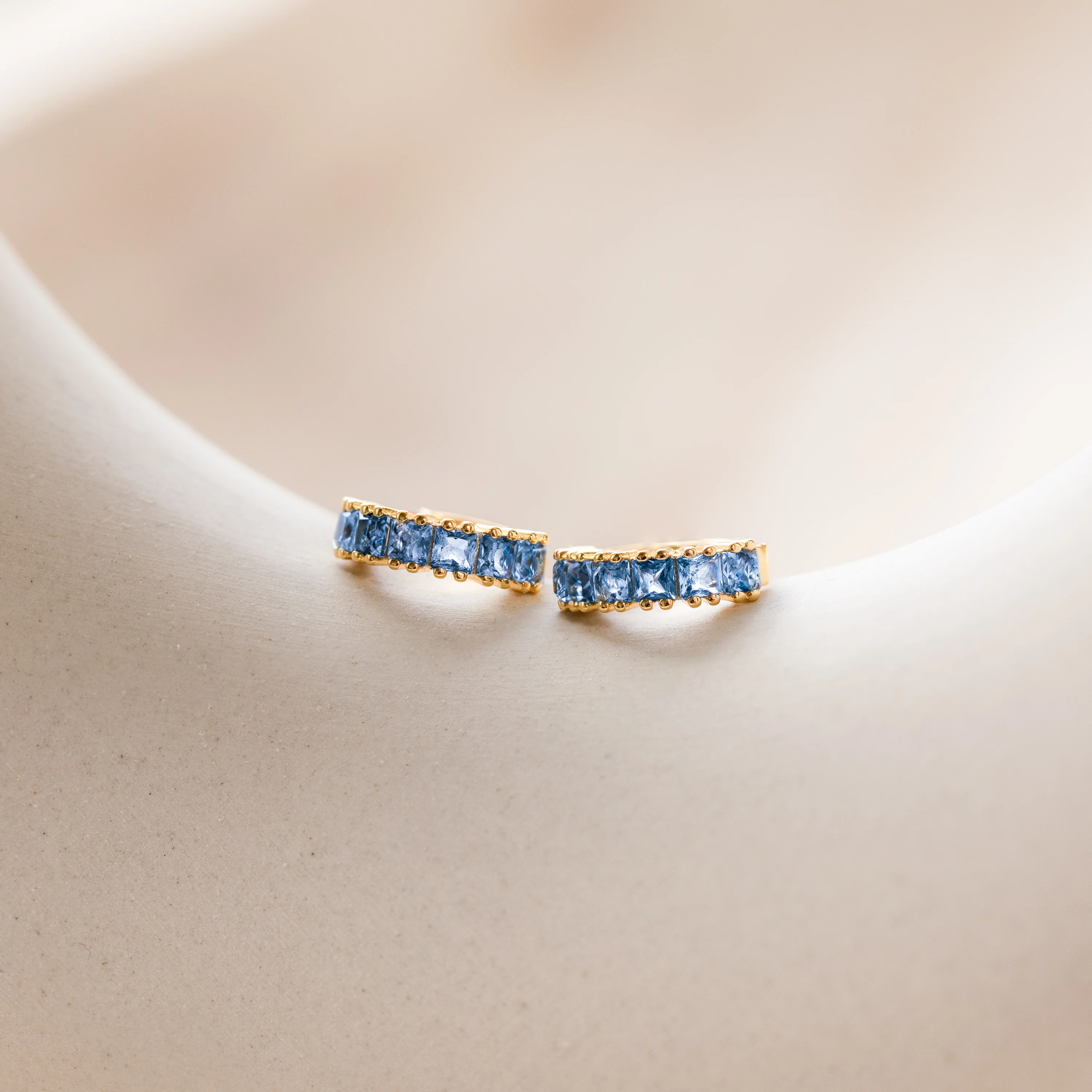 Genevieve Blue Topaz Huggies