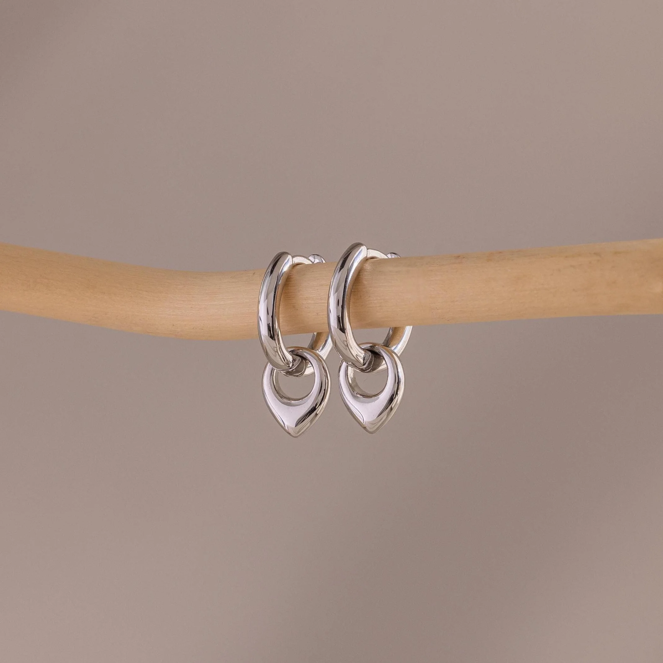 Tiny Teardrop Huggies in Silver